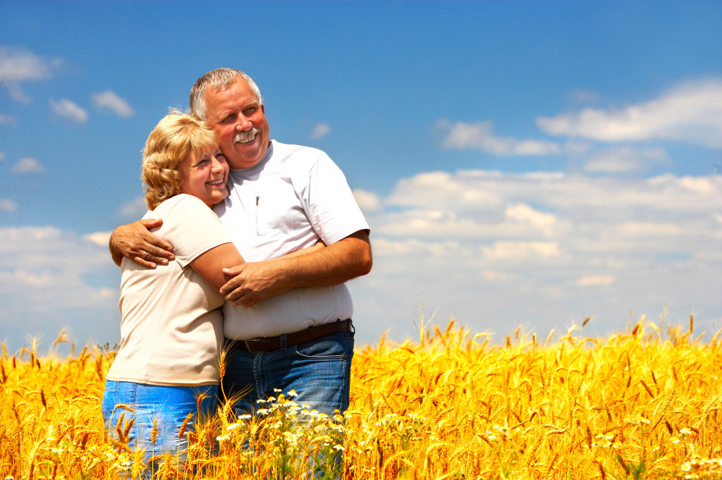 Happy Elderly Couple in Love Outdoor Google image from https://goodrumfinancial.com/retirement-income-home/smiling-happy-elderly-couple-in-love-outdoor/
