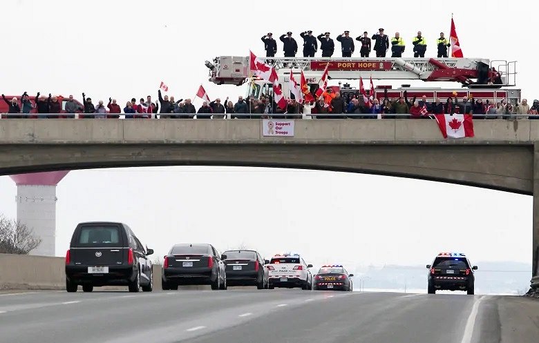 https://i.cbc.ca/1.2989684.1426025175!/fileImage/httpImage/image.jpg_gen/derivatives/original_780/highway-of-heroes-andrew-doiron.jpg Canada honours Sgt. Andrew Doiron on the Highway of Heroes. Body of Canadian soldier killed in Iraq returns home by Michael Bolen, CBC News, 10 Mar 2015 Google image from https://www.cbc.ca/news/politics/canada-honours-sgt-andrew-doiron-on-the-highway-of-heroes-1.2989395