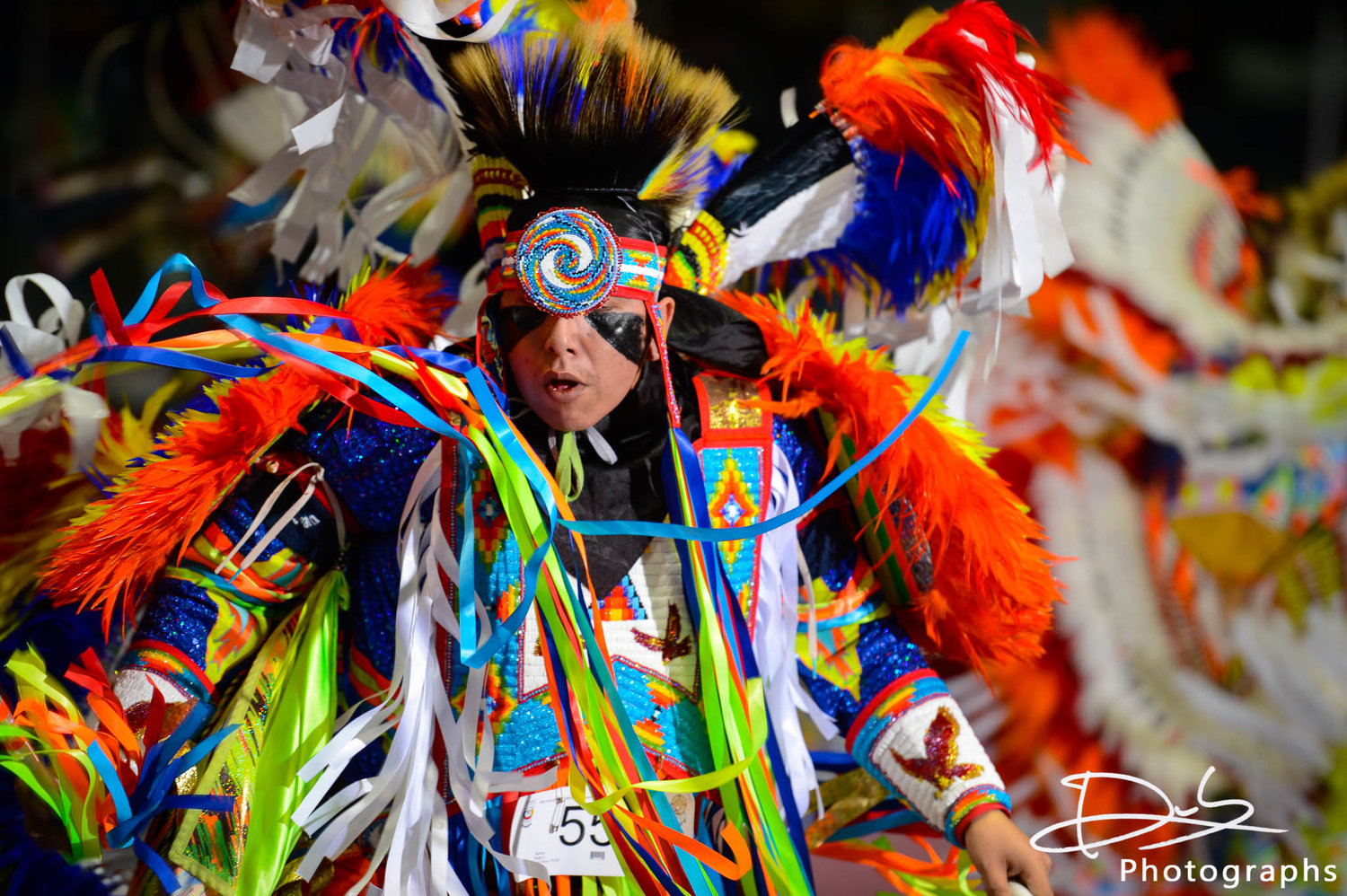 Powwow Dancer Google image from First Nations University of Canada Annual Spring Celebration Pow Wow, April 21 & 22, 2018 - https://www.fnunivpowwow.ca/dancers-singers-drummers/