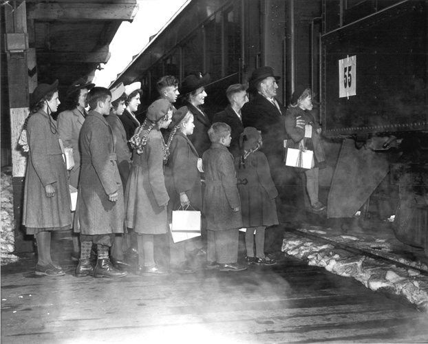 Van Helvert Family Boarding Train which left Pier 21 Halifax where they landed - image from http://www.pier21.ca/sites/default/files/gallery/10442/vanhelvertfamilycollectionpier21society-vanhelvertfamilyboardingtrainpier21.jpg