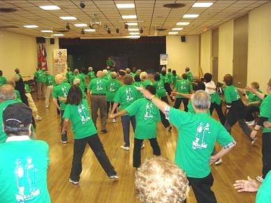 Walk-a-Thon Participants Warming Up in Auditorium October 1 2010 photo by Lina Zita