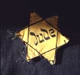 The Yellow Star - Jude Badge of Shame image from http://history1900s.about.com/od/holocaust/a/yellowstar.htm